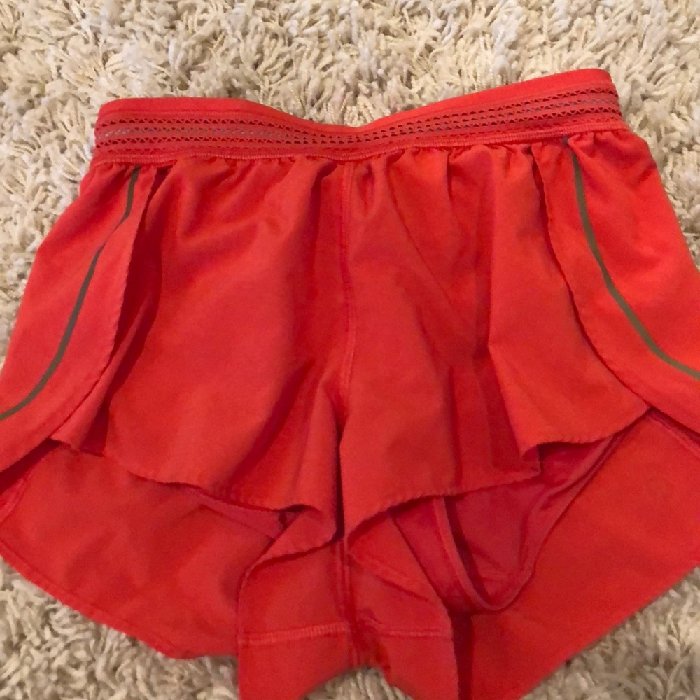 orange lulu shorts size 2 with waistband details
